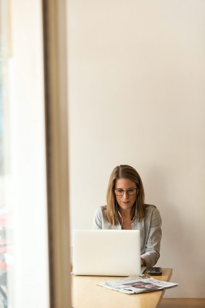 A Lady Performing Death Certificate Search Online