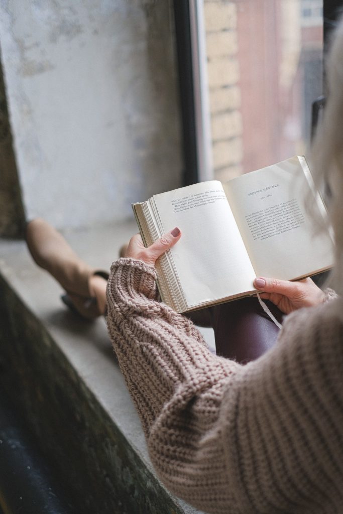 A lady reading quotes after death of a friend