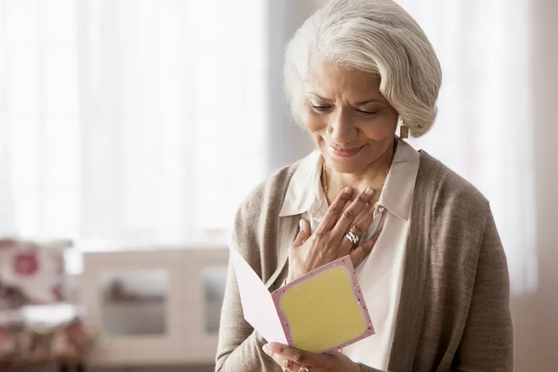 A Lady reading Short Condolence Messages