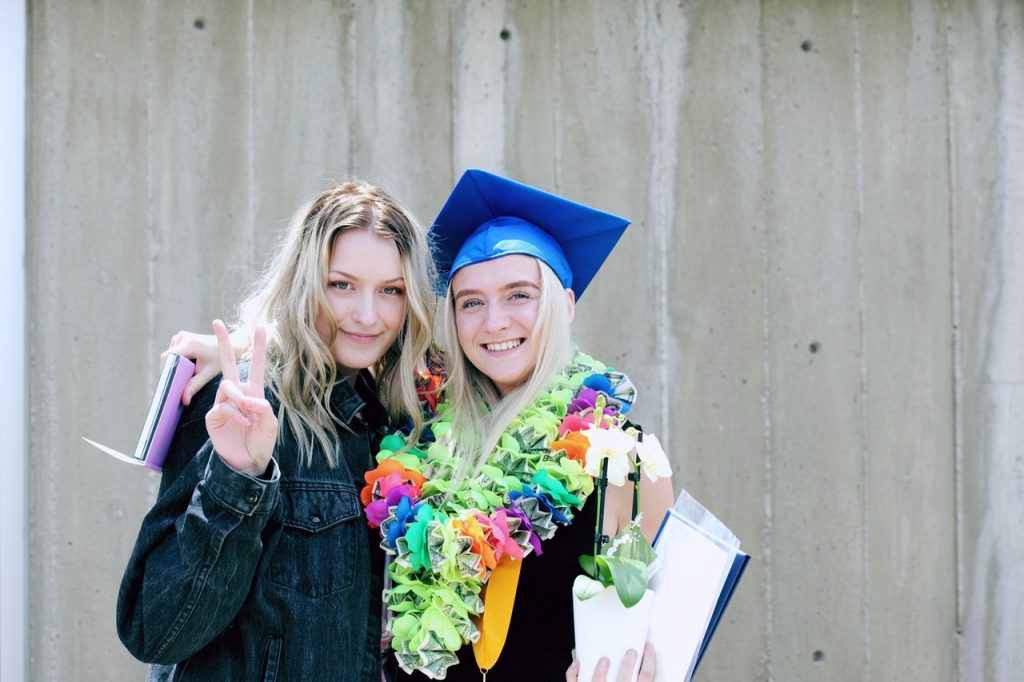 Lady students celebrating life milestones